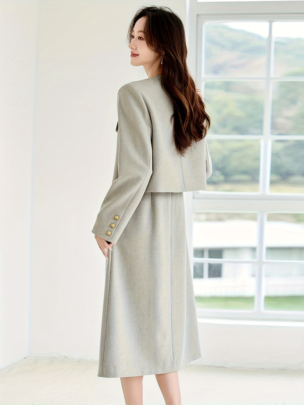 Elegant French-Inspired Two-Piece Set: Spring\u002FAutumn Long Sleeve Jacket with Waist-Cinching Design and a Skirt with Spaghetti Straps, Featuring a Button Detail, Perfect for a Chic Look